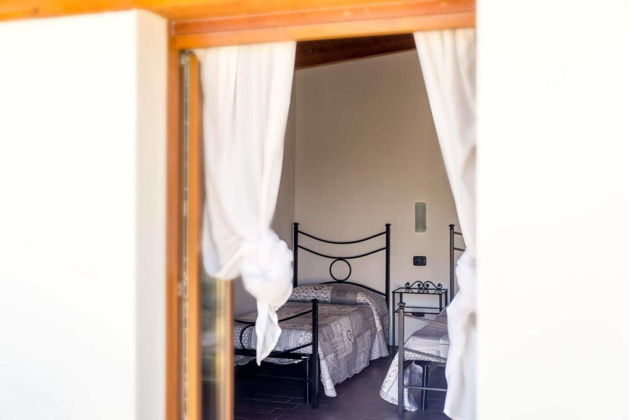Affittacamere La Palazzina カヴァルカゼッレ 部屋 写真
